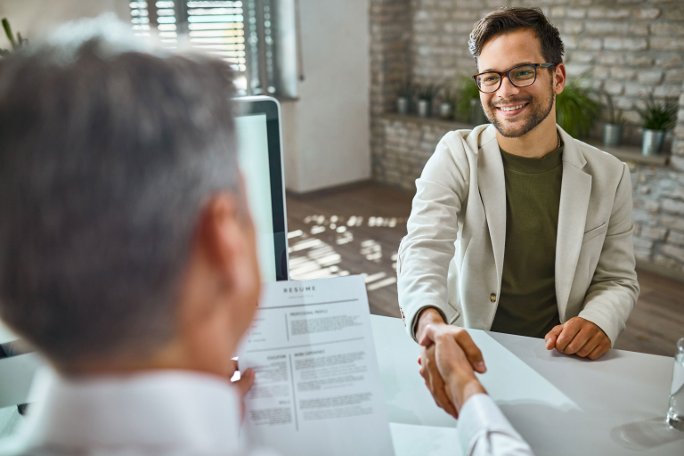 happy male candidate greeting member human resource team job interview office2