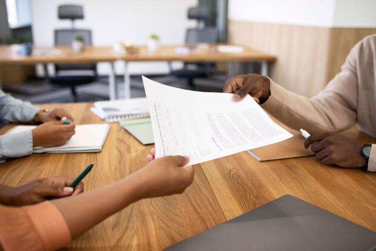 man holding contract his new office job after interview2